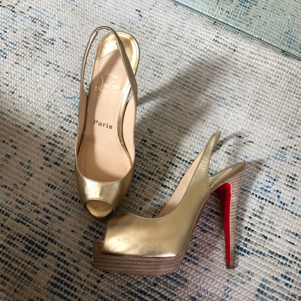 Christian Louboutin heels- lightly worn